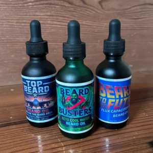 Three-bottle nostalgic beard oil combo featuring Top Beard, Beard Busters, and Beard to the Future